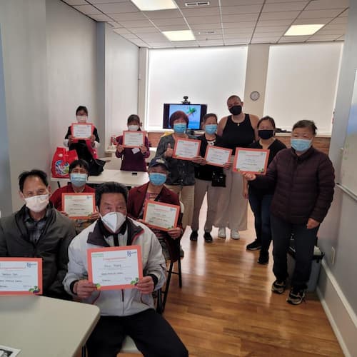 Graduation at North East Medical Services (NEMS), Chinatown SF. NEMS staff facilitates the class in Mandarin and Cantonese.